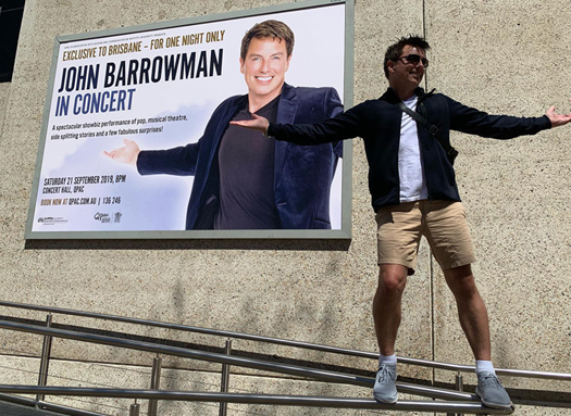 John with Poster for QPAC