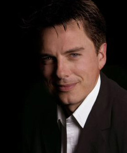John promo photo for Maria